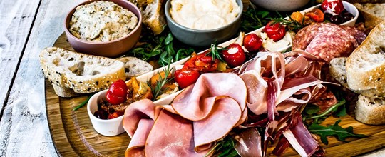 Antipasto platter to include olives, cured meats, bocconcini, marinated vegetables, dips and grilled Turkish bread