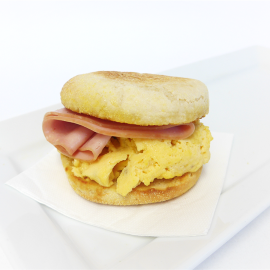 English Muffin: Leg ham, scrambled egg, house-made tomato relish and tasty cheese